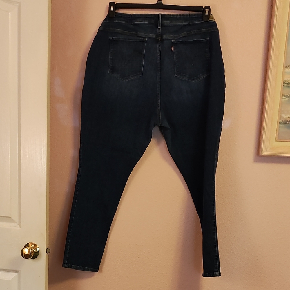 Levi's Blue Skinny Jeans with Tapered Leg and Distressed Details